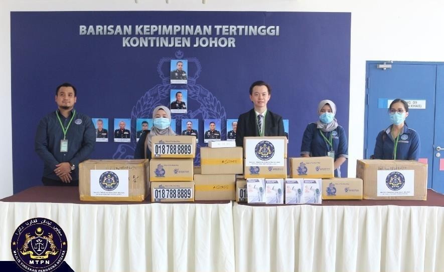 Support for frontline personnel: Health protection supplies for the Johor police contingent.